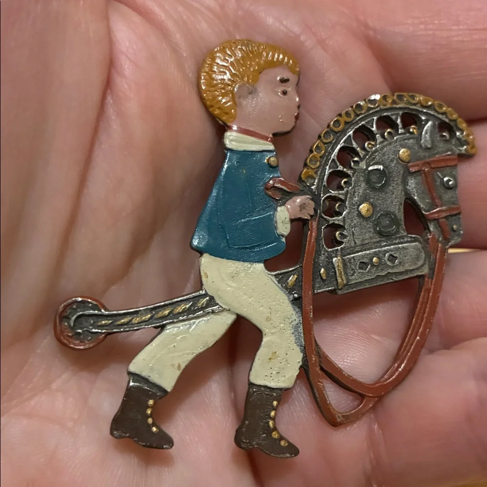 Vintage metal toy horse ornaments.  Rocking horse and stick horse